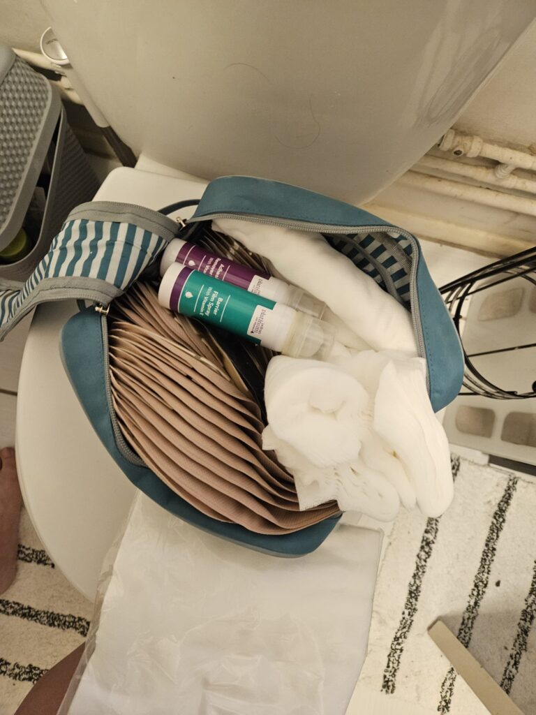 A bag full of kit a stoma patient uses for travelling.
